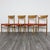 An elegant set of four Scandinavian-style dining chairs dating back to the 1960s. The frame is made of solid wood with...