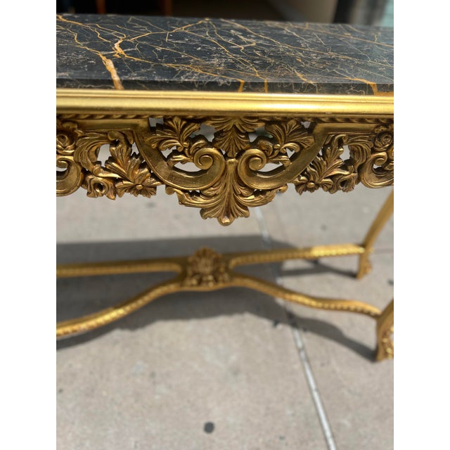 Carved Vintage Louis XV Rococo console table in Real Solid wood with Real Natural Marble Top and gilt wood legs gilded in...