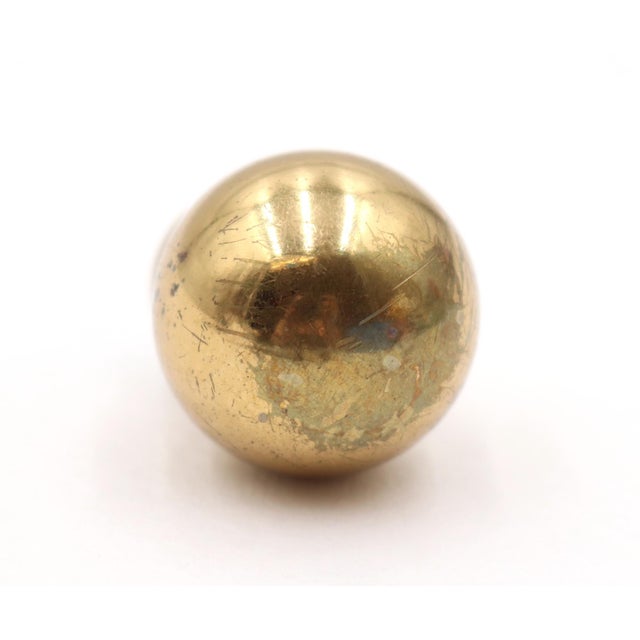 Reclaimed ball shaped cabinet or drawer knob, made of brass with a polished finish. A mounting screw is included. Good...