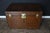 This magnificent Louis Vuitton trunk is truly unique in its dimensions and because it is crafted entirely from leather. A...
