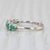 Gemstone Information: - Natural Emeralds - Total Carats - 0.42ctw Cut - Round Color - Green Treatment - Oiling - Natural...