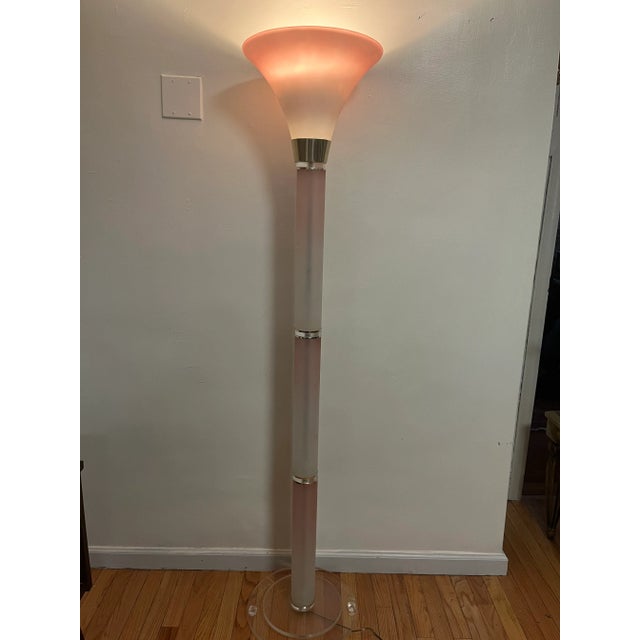 Dramatic fluted torchiere standing lamp with frosted pink opaline glass shade in a tulip shape Glass, chrome and lucite...