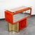 1970s Italian entryway cabinet with mirrored front drawers and orange velvet detailing. Glass top surface suctions to the...