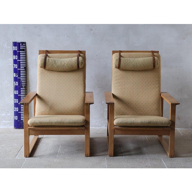 Oak sled lounge chairs Model 2254, designed by Børge Mogensen, Denmark, in 1956, and produced by Fredericia Stolefabrik....
