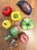This set of various types of hand-painted fruit is created in the traditional Italian "Majolica style," known for its...