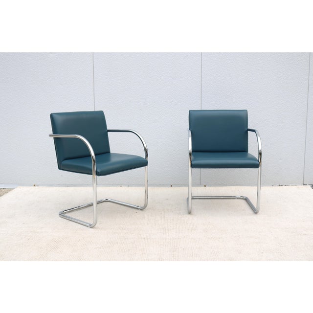 Fabulous pair of Brno tubular chairs in colonial blue leather. An icon of Modernist classic heavily rooted in the Bauhaus...