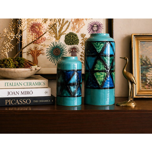 These will take your breath away! A truly stunning and highly-collectible pair of mid-century Italian ceramic vases by...