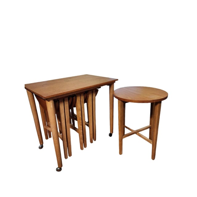 Lovely 5 table nesting table set in solid teak, designed by Poul Hundevad, circa 1960's. All tables working in good order,...