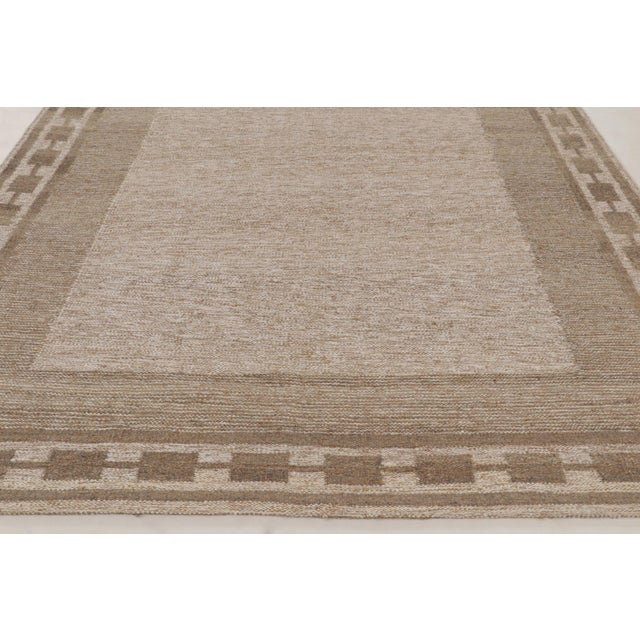 Handwoven in an innovative, eco-conscious blend of natural aloe, hemp, and linen, this oversized 9x13 flatweave rug is a...