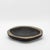 The Lily Bowl in black shagreen with brass details by R&Y Augousti exudes refined elegance through its striking contrast...