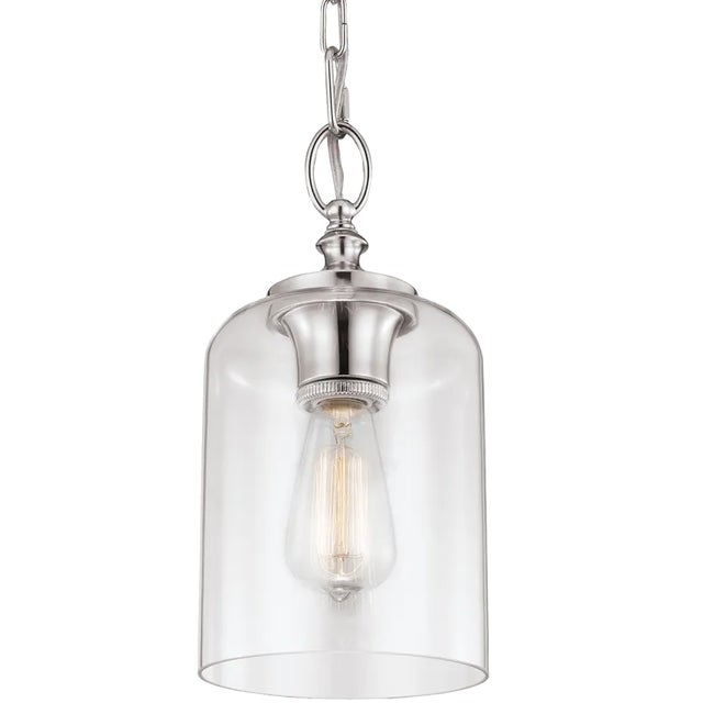 The unique, elongated dome shade is just the beginning of the design details featured in pendants and flush mounts of the...