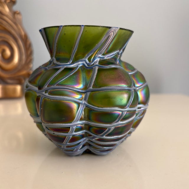 Beautiful petite example of Pallme-Konig & Habel Bohemian art glass circa 1900. This piece exhibits a bottle green...