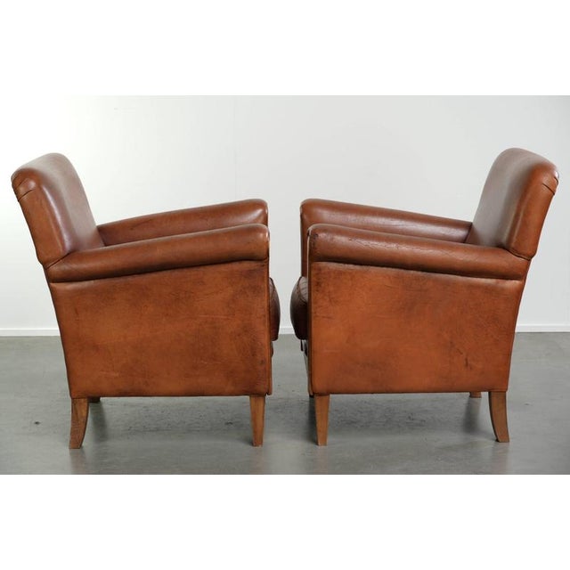 This beautiful set of comfortable sheepskin armchairs features a timeless design in lovely colors. The armchair is a...