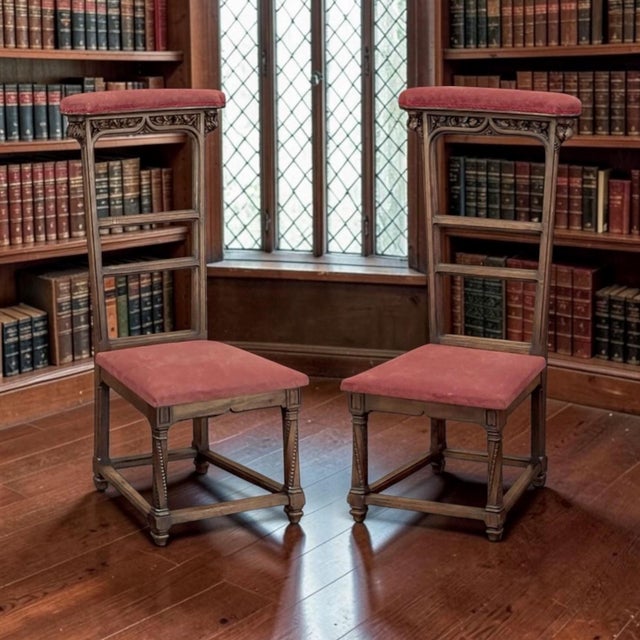 A remarkable and rare pair of French Gothic Revival prie Dieu, masterfully handcrafted from solid walnut during the 19th...