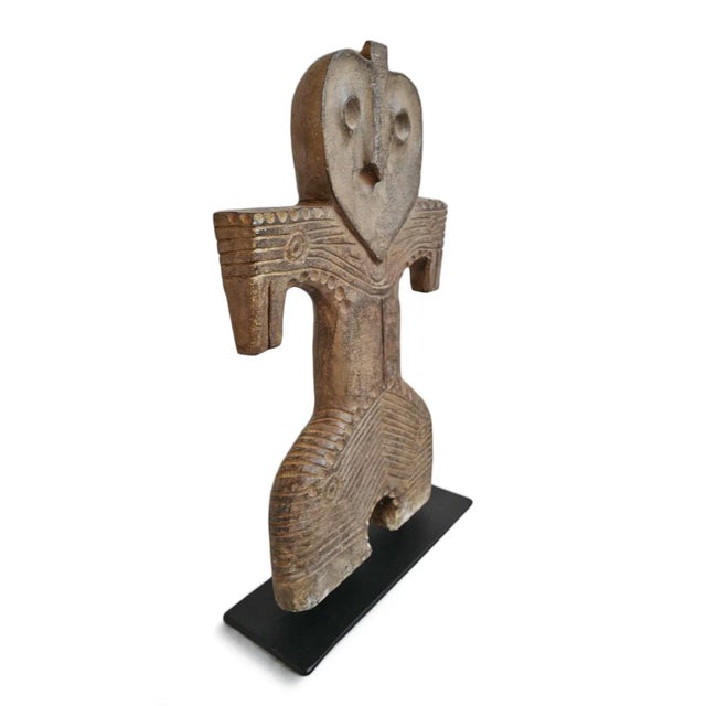 Vintage Java stone property marker carefully mounted on iron display stand. Each has slight variations and each is sold...