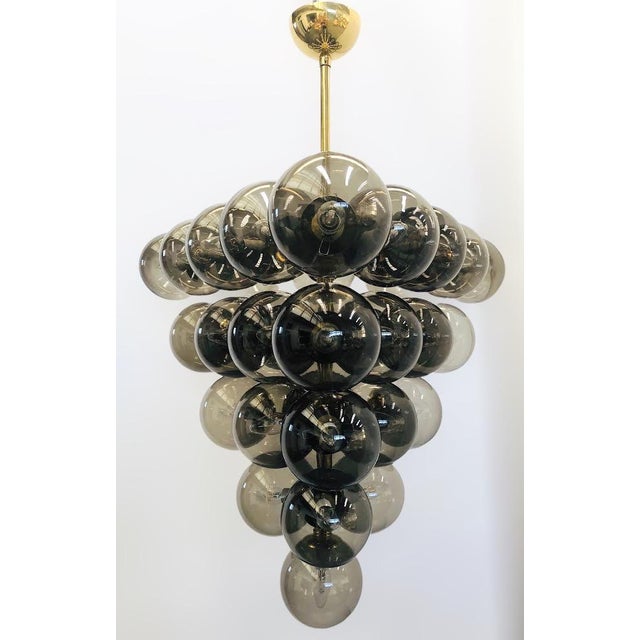 Italian chandelier with smoky Murano glass globes mounted on polished brass finish frame / Made in Italy by Fabio Ltd 31...