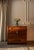 This American walnut chest of drawers dates to circa 1880. Heavily influenced by Neoclassical design, it features rich...