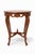 Beautiful walnut lamp table with a fluted round top. Geometric line details across the top. Pretty cabriole legs. The...