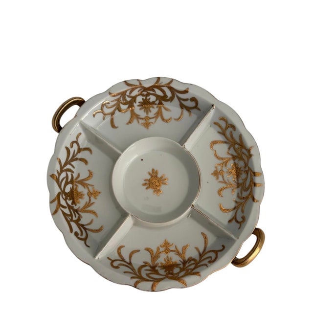 Vintage Japanese five-part porcelain condiment serving plate, hand-painted in 22K gold with a decorative flourish. Minor...