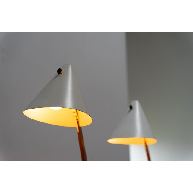 Elegant pair of table lamps by renowned Swedish designer Hans-Agne Jakobsson for Markaryd, designed in 1955. Each lamp...