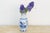 A vase like this carries its decoration the way a good story carries a reader, one reserve panel doing all the work. Set...