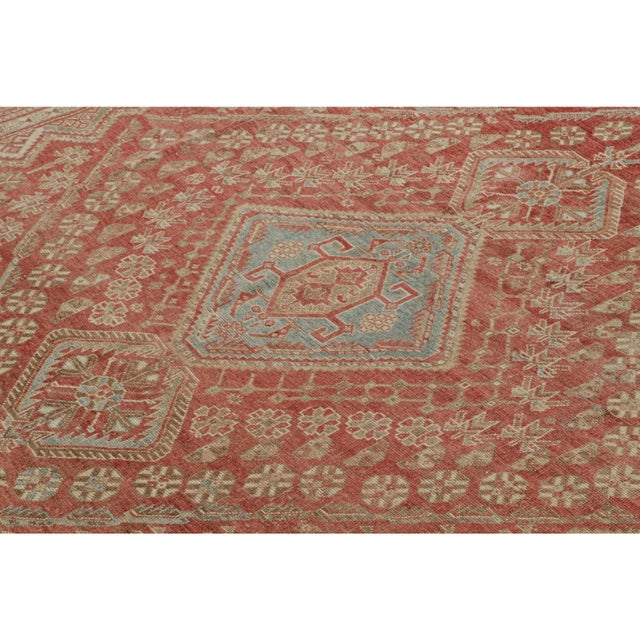 Hand-knotted in wool and originating from Turkey circa 1950-1960, this 6x9 vintage Ersari rug is from the same provenance,...