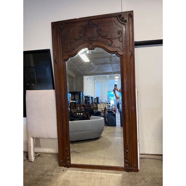 Design Plus Gallery presents a Trumeau Mirror with French Louis XV Style Sense. This antique is often referred to as a...