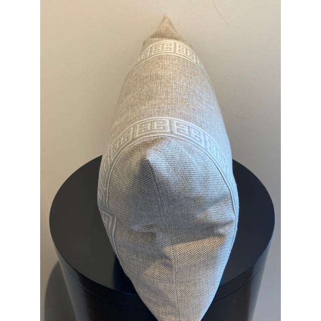 This elegant lumbar pillow features a sophisticated gray textured fabric that provides a timeless foundation for any...