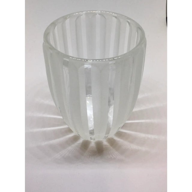 A lovely little crystal Bud vase in the style of Lalique but without the price tag. Nice weight to it and will work...