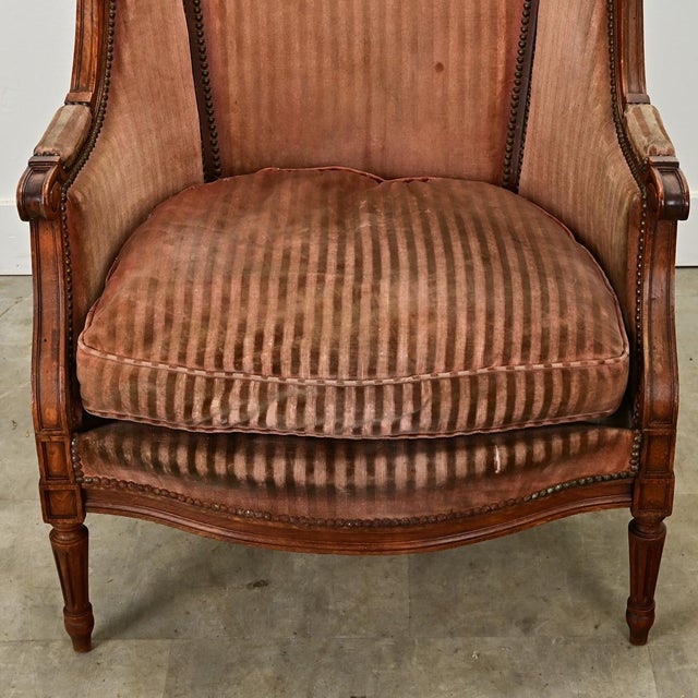 Dimensions: 35 ¼” H x 30” W x 30 ½” D A single French Louis XVI style bergere chair from the late 1800s to accent any...
