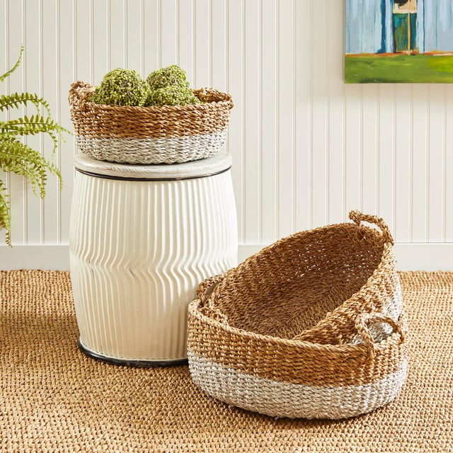 Seagrass shallow baskets are a fresh way to add that upscale, beachy look to any space. Seagrass is doublewalled baskets...