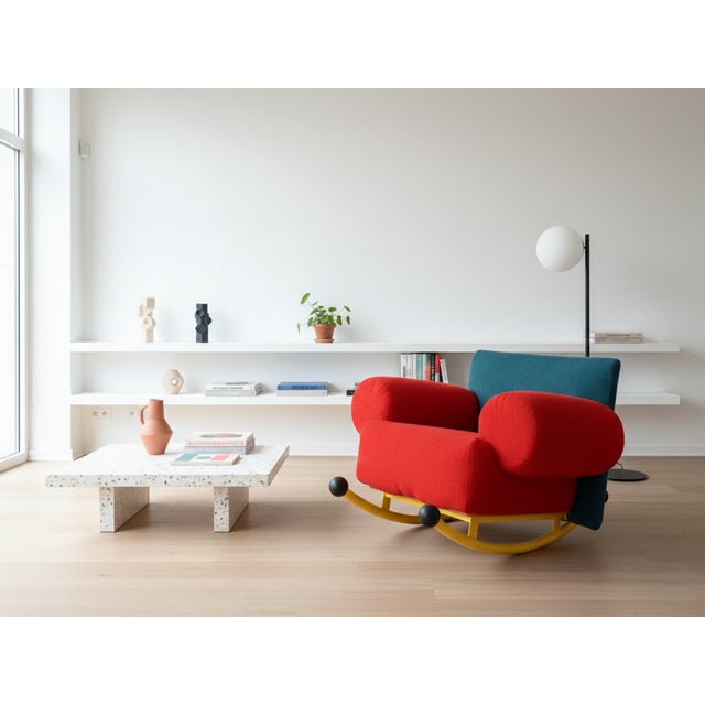 Bring a bold punch of postmodern playful energy into your space with this rare "topolino" rocking chair. Designed in the...