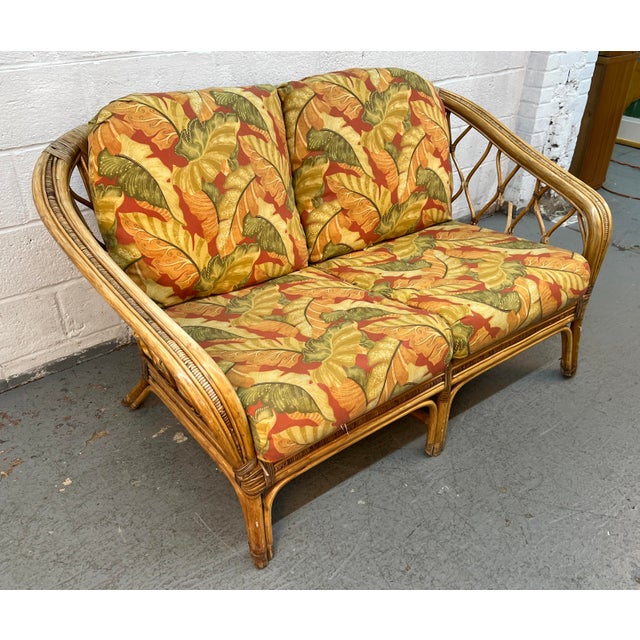 Add timeless charm and vintage character to your home with this beautiful Vintage Bentwood and Rattan Loveseat. Blending...