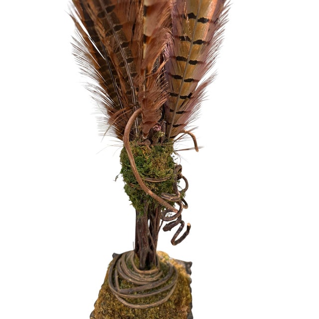 This is a very attractive piece with a high-end rustic aesthetic. It is a vintage natural pheasant feather arrangement...