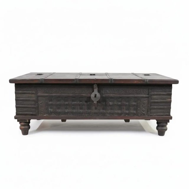 Dimensions: 50.5" W x 25" D x 18" H Add character and functionality to your living space with this unique vintage wood and...