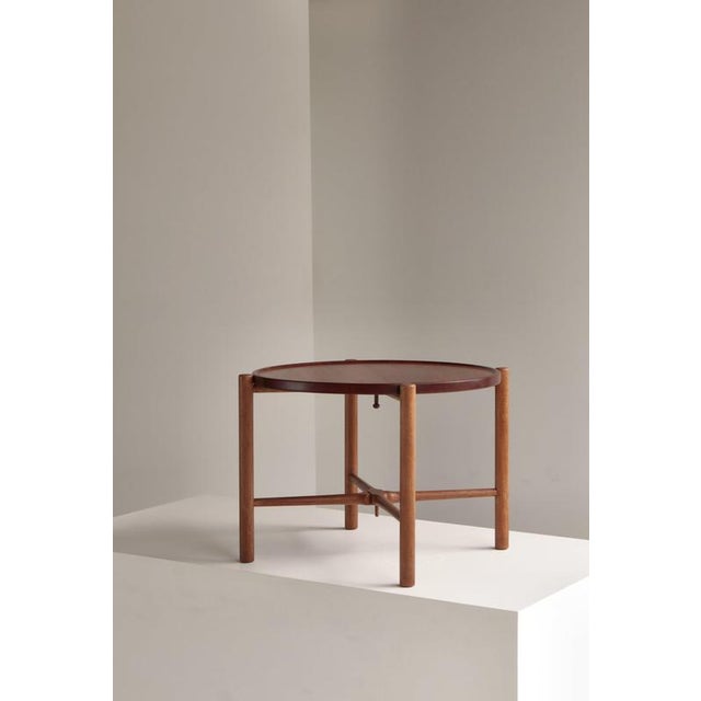 A rare and highly sought-after early production example of hans j. Wegner’s at-35 tray table, manufactured by andreas...