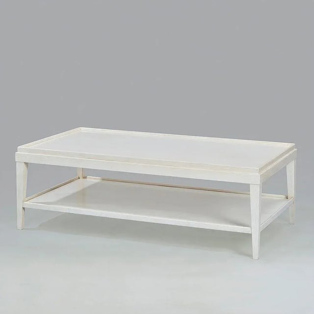 Classic Rustic rectangular coffee table with 'drift' white lacquer finish with a subtle grey distressing, a wooden...