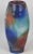 Large and colorful hand blown Murano glass vase by Maestro Giuliano Tosi. Vibrant colors of blue, orange, green and red...