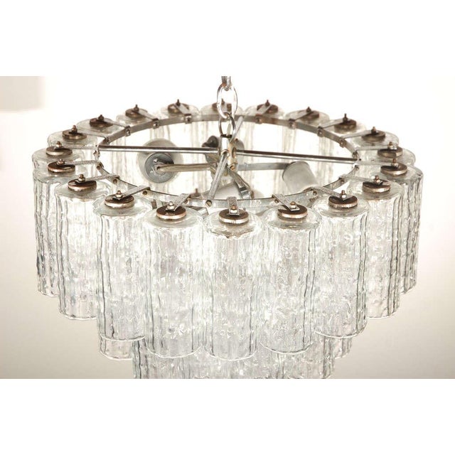 Outstanding three tiered rippled glass fixture by Venini.