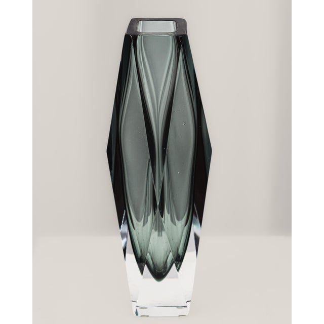 Faceted Murano glass vase in gray. This piece combines bluish-gray and clear glass with an eight-sided geometric facet...