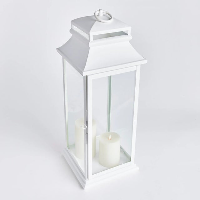 This tall, powder-coated stainless steel lantern in a matte white is tailor-made for your outdoor space. We've even...