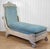 A Fine 1980's French Empire Style Chaise Lounge Solid Wood Construction with an Original Off-White Finish Heavily...