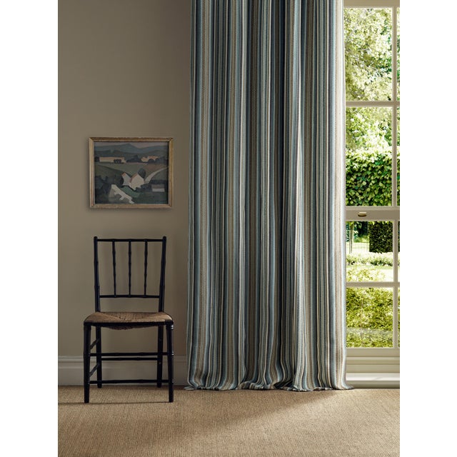 Woodford Stripe features a distinctive checkerboard section inspired by the border details of the Walthamstow design...