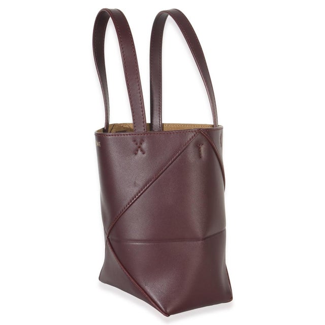Item #: 151344 Exterior Material: Leather MSRP: 1,990 Interior Material: Suede Size: Mini Handbag Closure Type: Open Top...