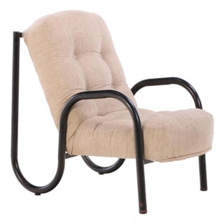 A French Tubular Iron Armchair, Circa 1960 For Sale