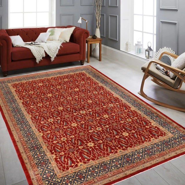 "Enhance the ambiance of your home with this magnificent Persian-influenced Turkish hand-knotted rug made by skilled...