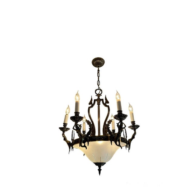 A beautiful pair of antique Neoclassical style chandeliers, made in England and dating from around the 1950’s. The quality...