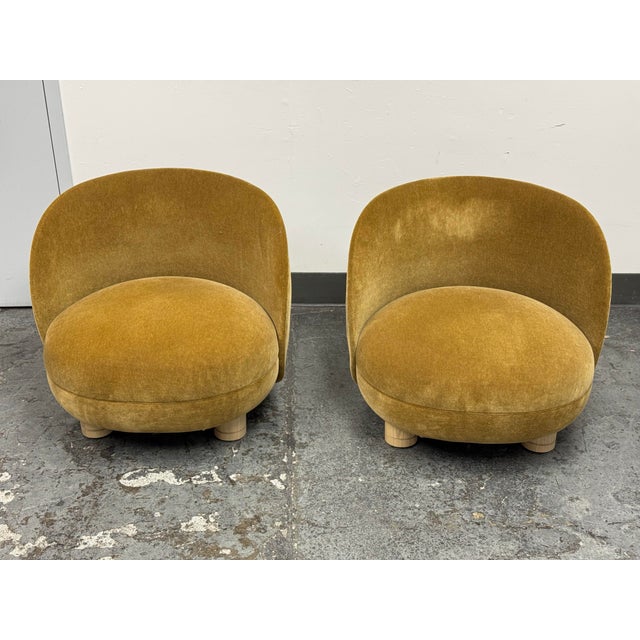 Design Plus Gallery presents a Pair of Mohair Brown Sugar Chairs. They offer a contemporary interpretation of the classic...