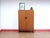 A beautiful compact armoire by renowned furniture maker G Plan, as part of their Quadrille range, this vintage teak...