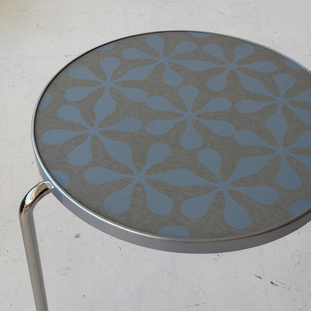 c. 1980s. Italy. Very rare tri leg table with chrome legs and patterned top. Tagged.